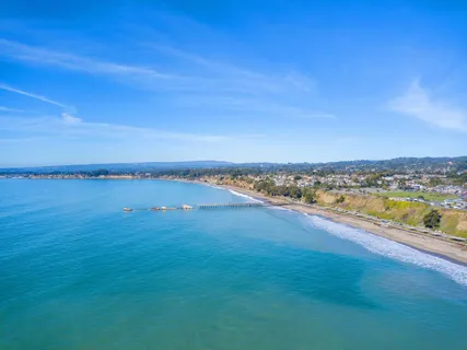 an aerial view of beach and ocean view