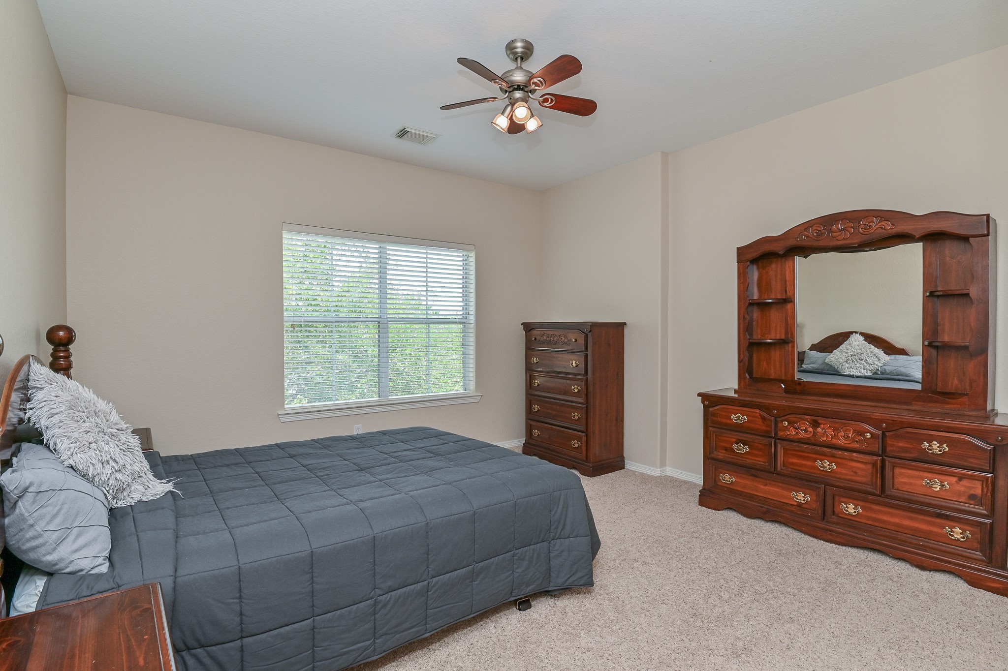 7218 Spring Run Lane Katy, TX 77494 - Photo 25 of 49 a bedroom with a bed and a painting on the wall