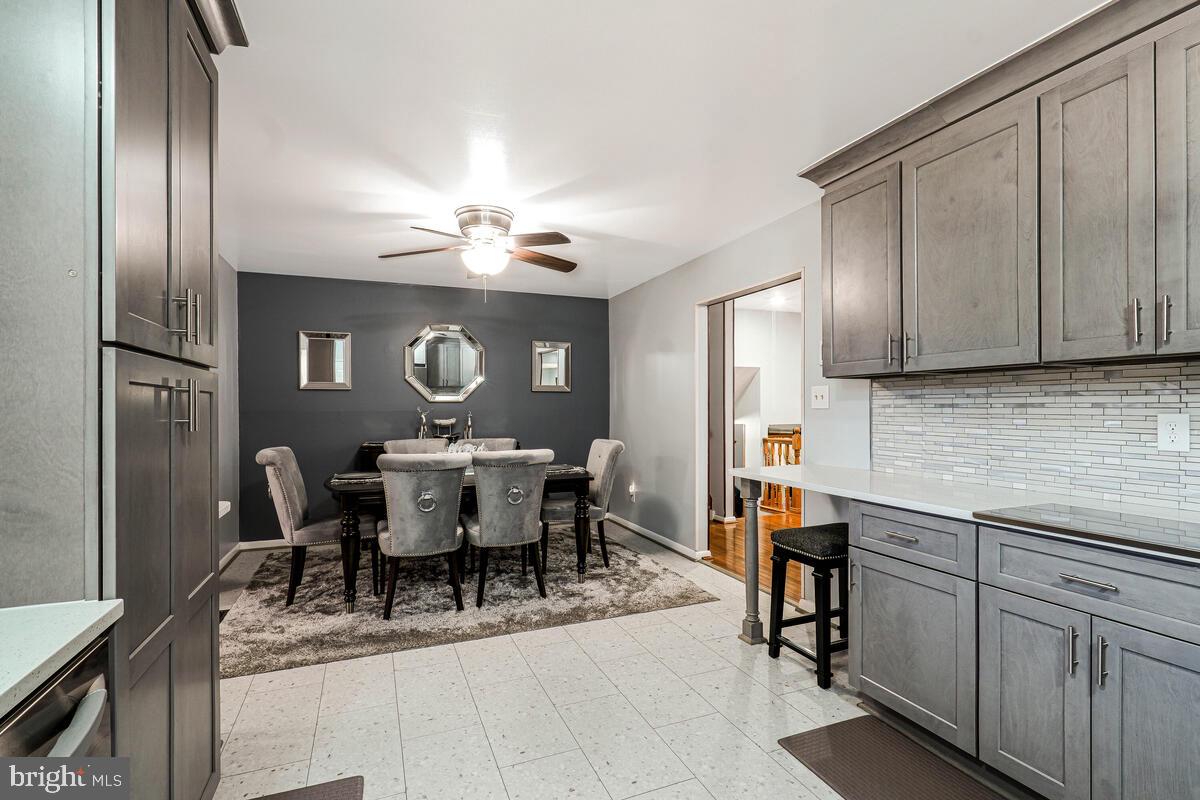 15937 Livingston Road Accokeek, MD 20607 - Photo 13 of 35 a view of a dining room with furniture and chandelier