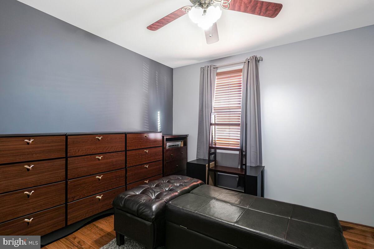 15937 Livingston Road Accokeek, MD 20607 - Photo 14 of 35 a bedroom with a bed and a window