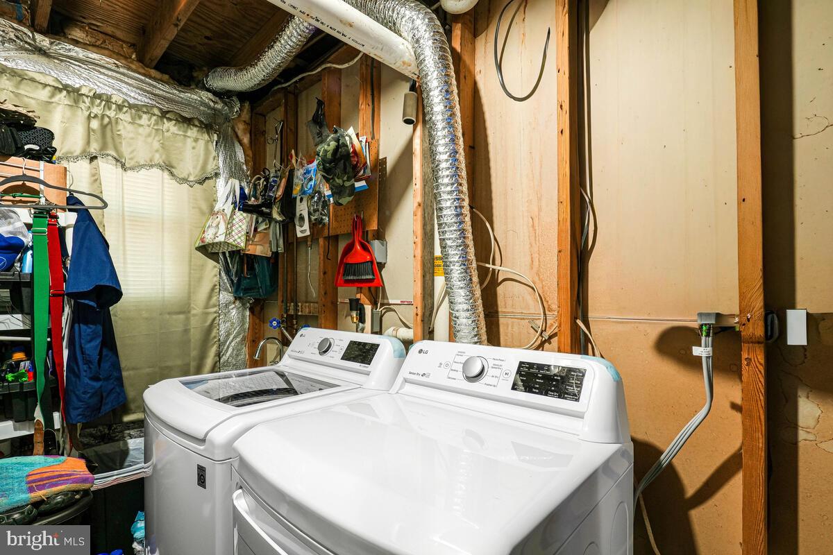 15937 Livingston Road Accokeek, MD 20607 - Photo 22 of 35 a utility room with dryer and washer