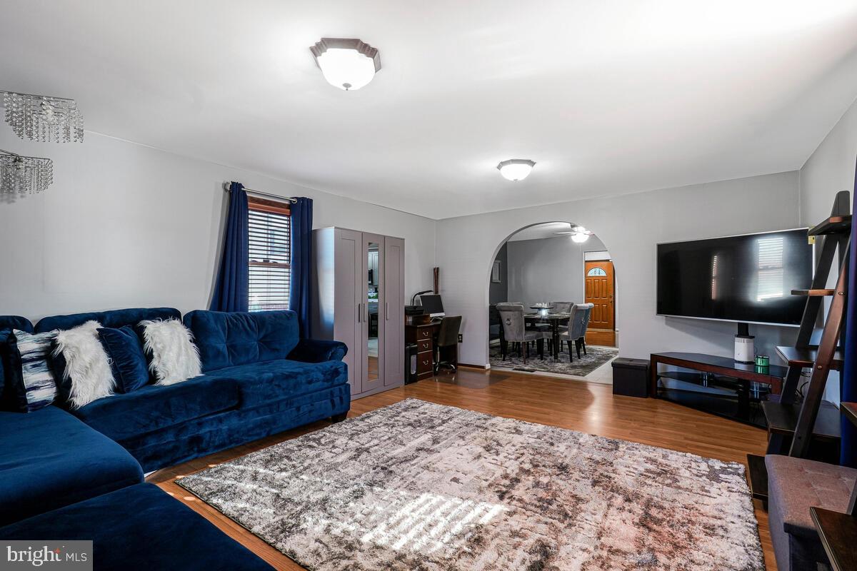 15937 Livingston Road Accokeek, MD 20607 - Photo 24 of 35 a living room with furniture and a flat screen tv