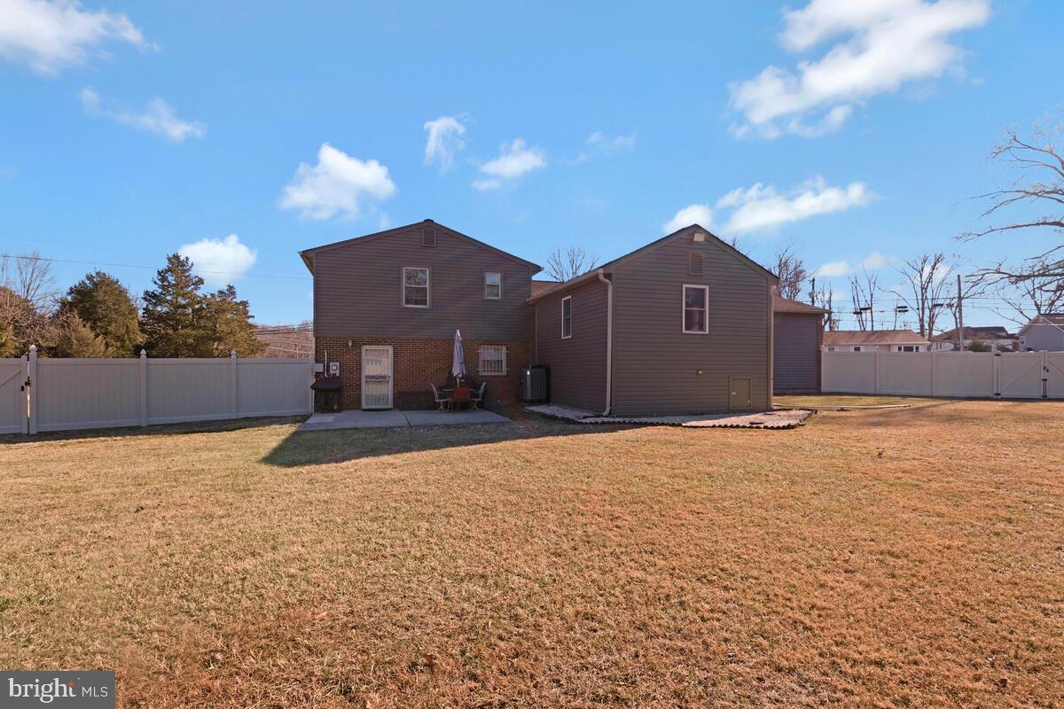 15937 Livingston Road Accokeek, MD 20607 - Photo 32 of 35 a view of a house with a yard