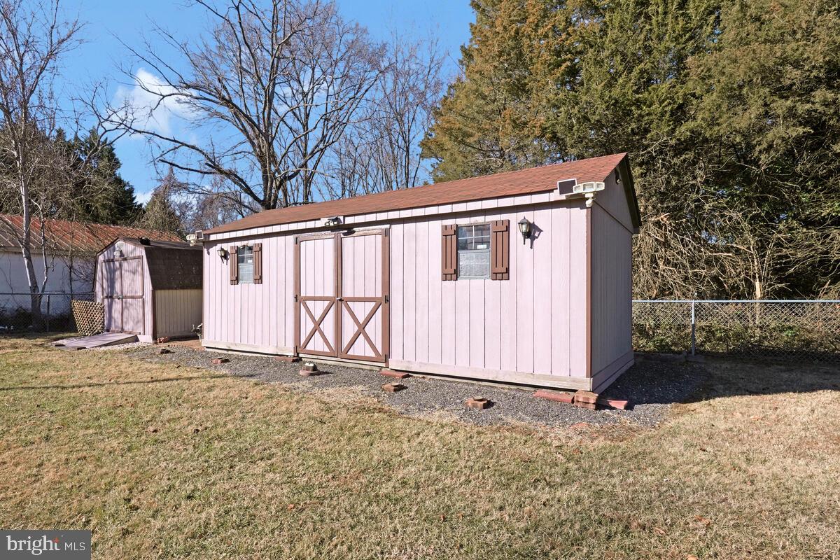 15937 Livingston Road Accokeek, MD 20607 - Photo 34 of 35 a view of a house with a yard