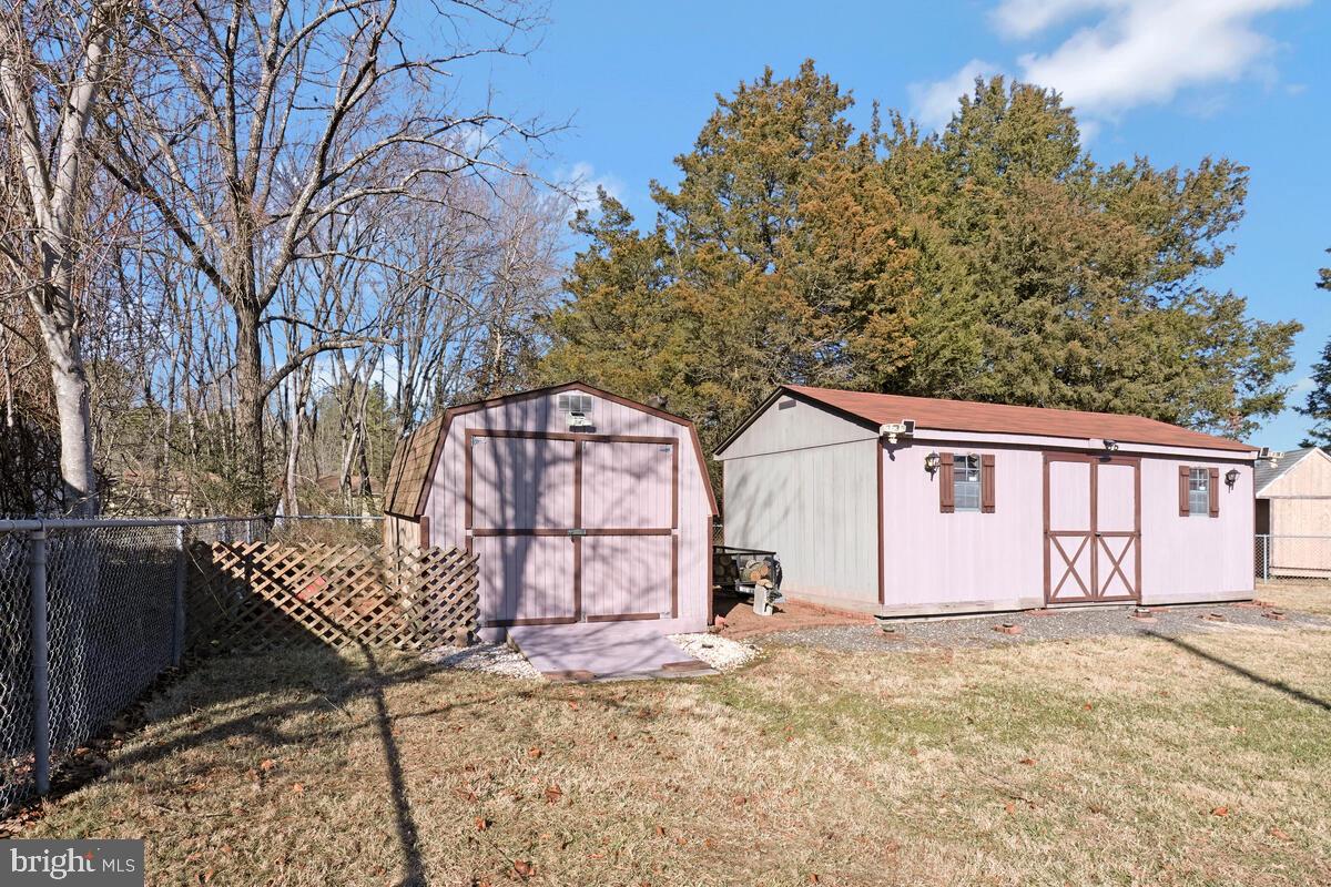 15937 Livingston Road Accokeek, MD 20607 - Photo 35 of 35 a view of a house with a yard covered in snow