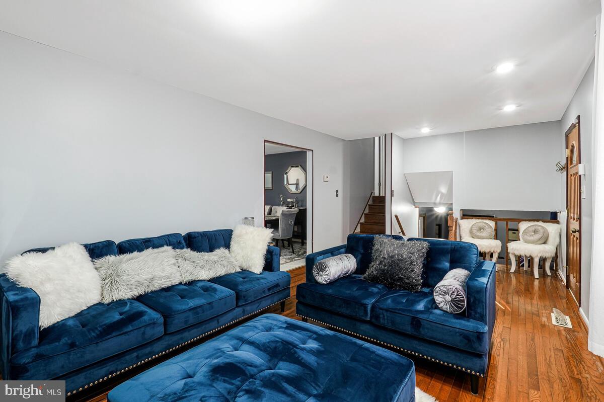 15937 Livingston Road Accokeek, MD 20607 - Photo 6 of 35 a living room with furniture and a wooden floor