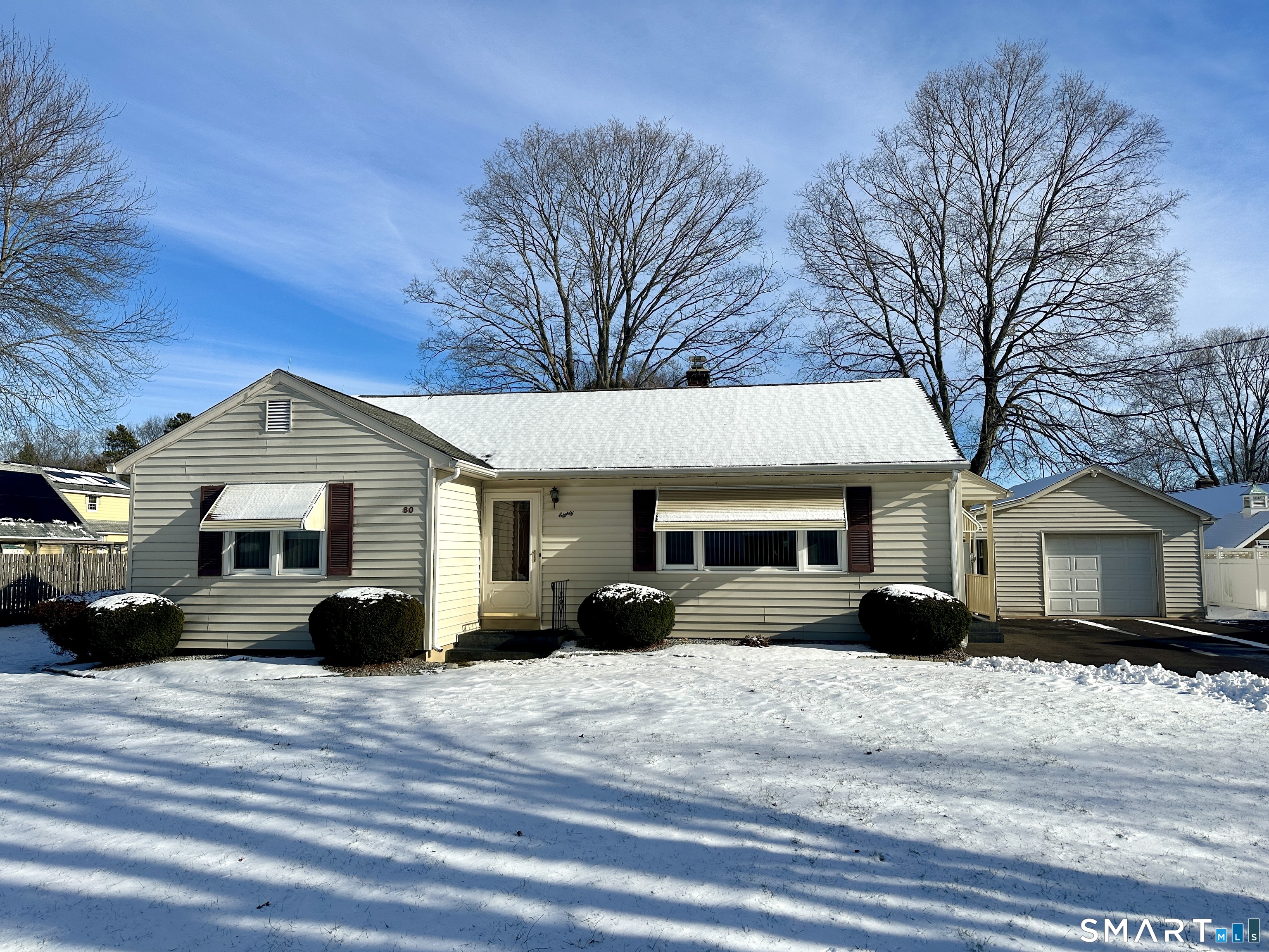 80 Southwest Avenue Windsor Locks, CT 06096 - Photo 1 of 1 a view of a house with a yard covered in snow
