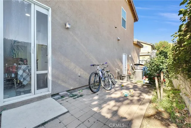 a view of a backyard of the house