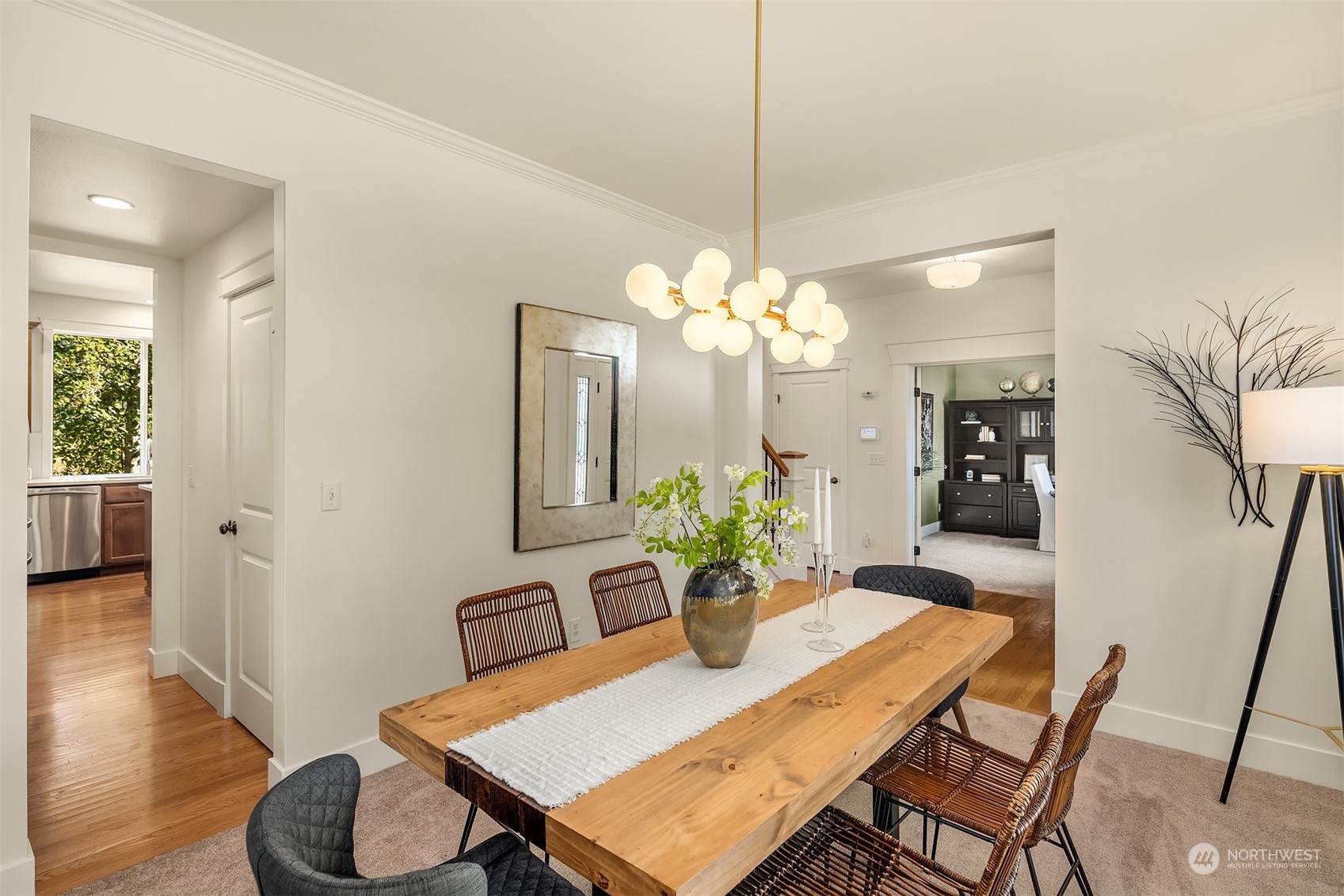 16529 38th Avenue Southeast Bothell, WA 98012 - Photo 17 of 40 a view of a dining room with furniture and wooden floor
