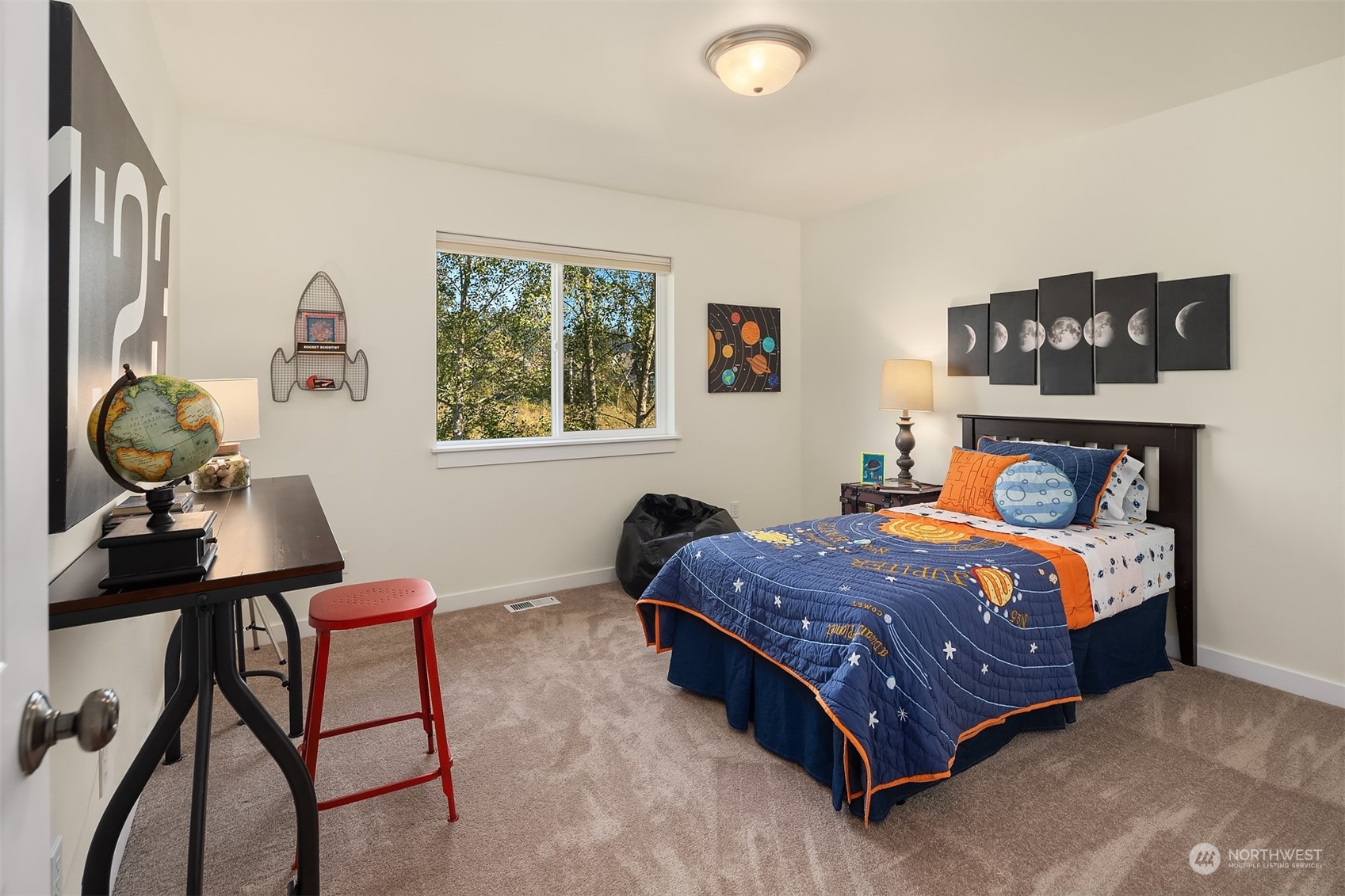 16529 38th Avenue Southeast Bothell, WA 98012 - Photo 33 of 40 a bedroom with a bed and window