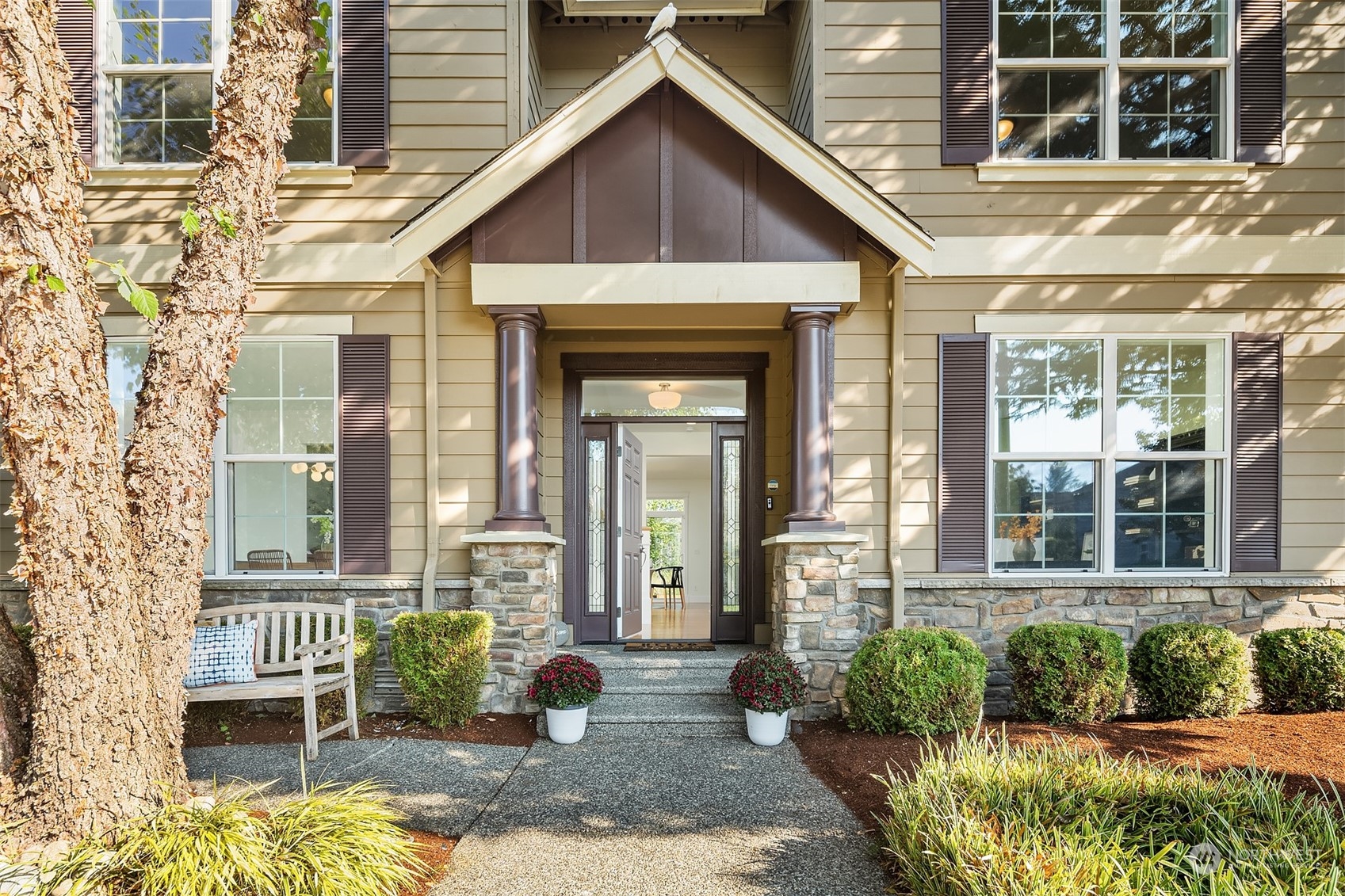 16529 38th Avenue Southeast Bothell, WA 98012 - Photo 5 of 40 a front view of a house with a yard