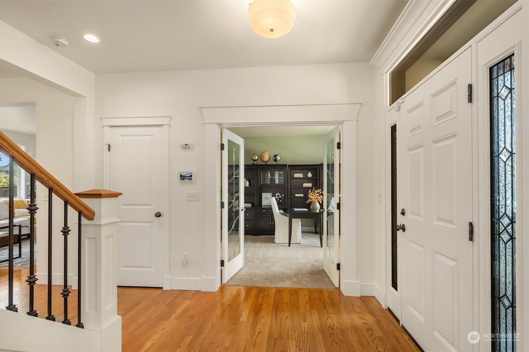 16529 38th Avenue Southeast Bothell, WA 98012 - Photo 8 of 40 a view of a hallway with wooden floor and staircase