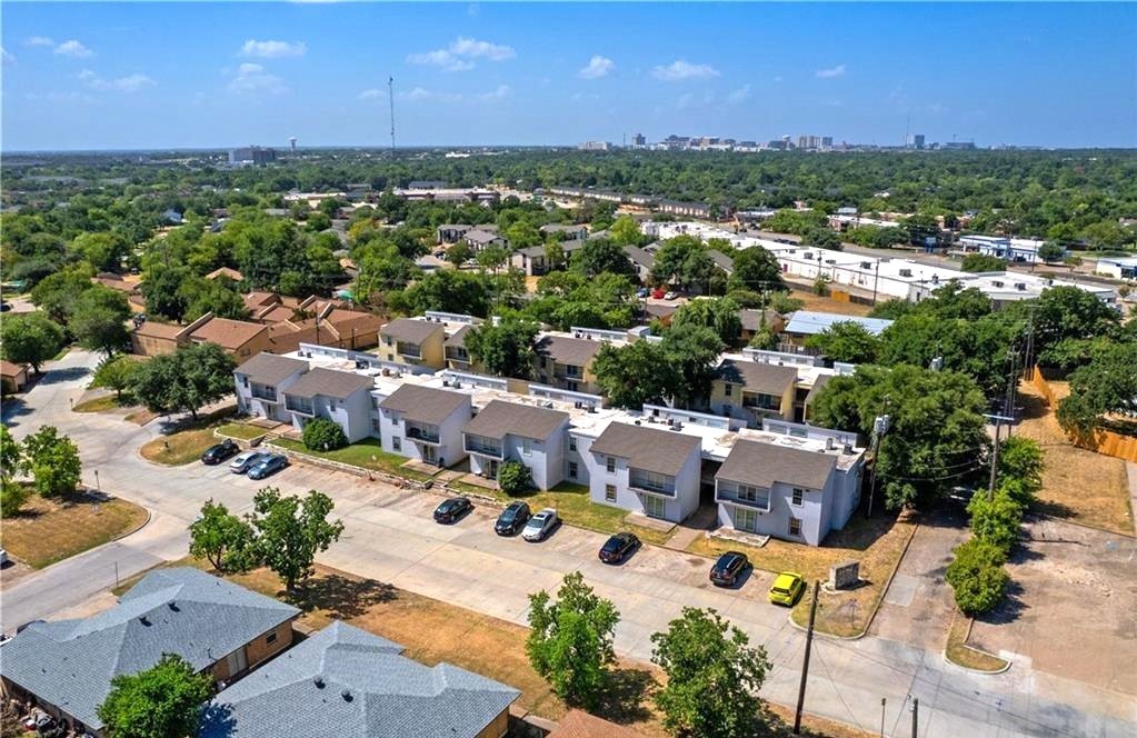 2000 Kazmeier, Unit 7 Bryan, TX 77802 - Photo 9 of 9 an aerial view of a city with lots of residential buildings