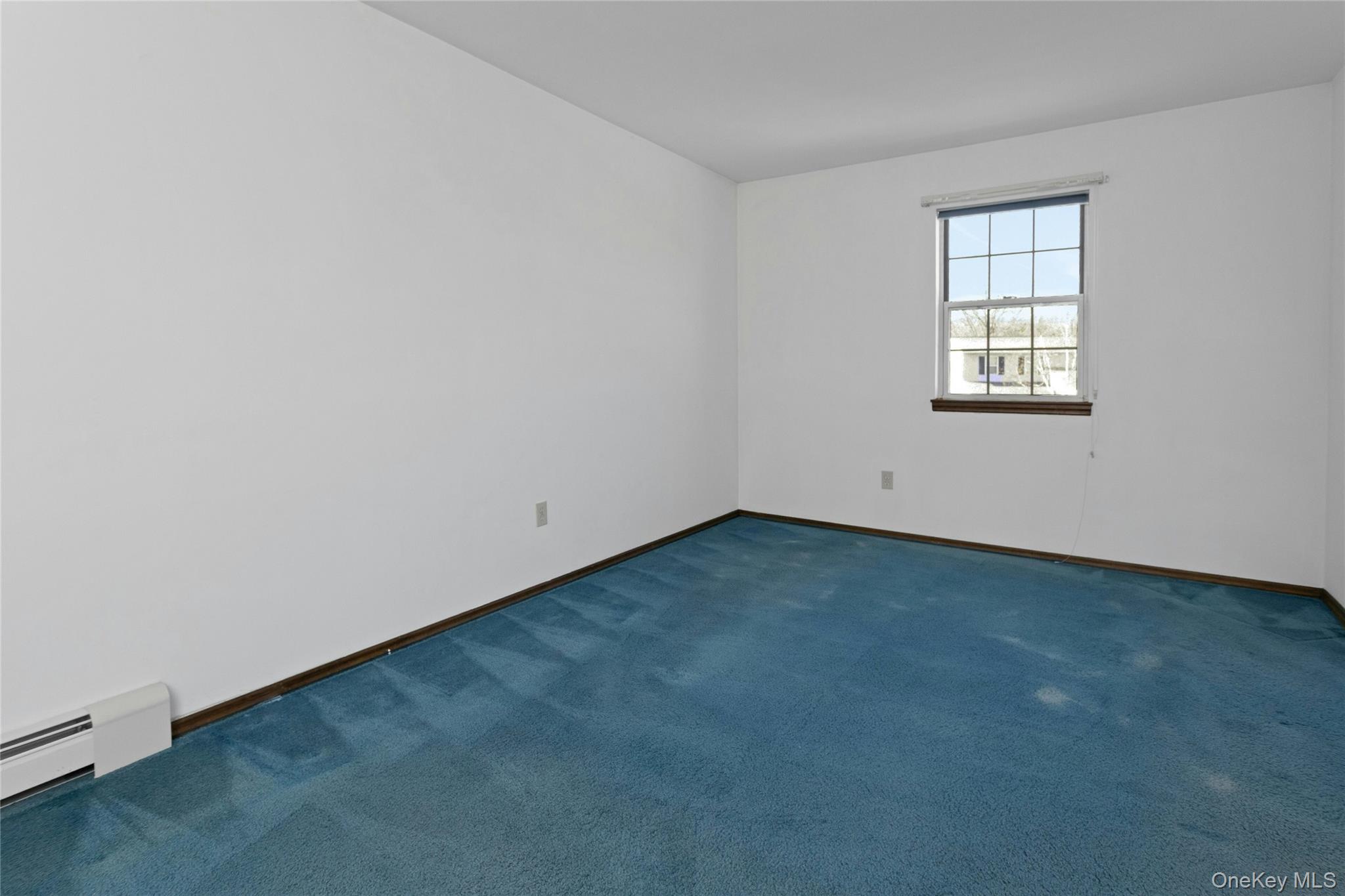 6 Elm Court Fishkill, NY 12524 - Photo 11 of 18 an empty room with a window