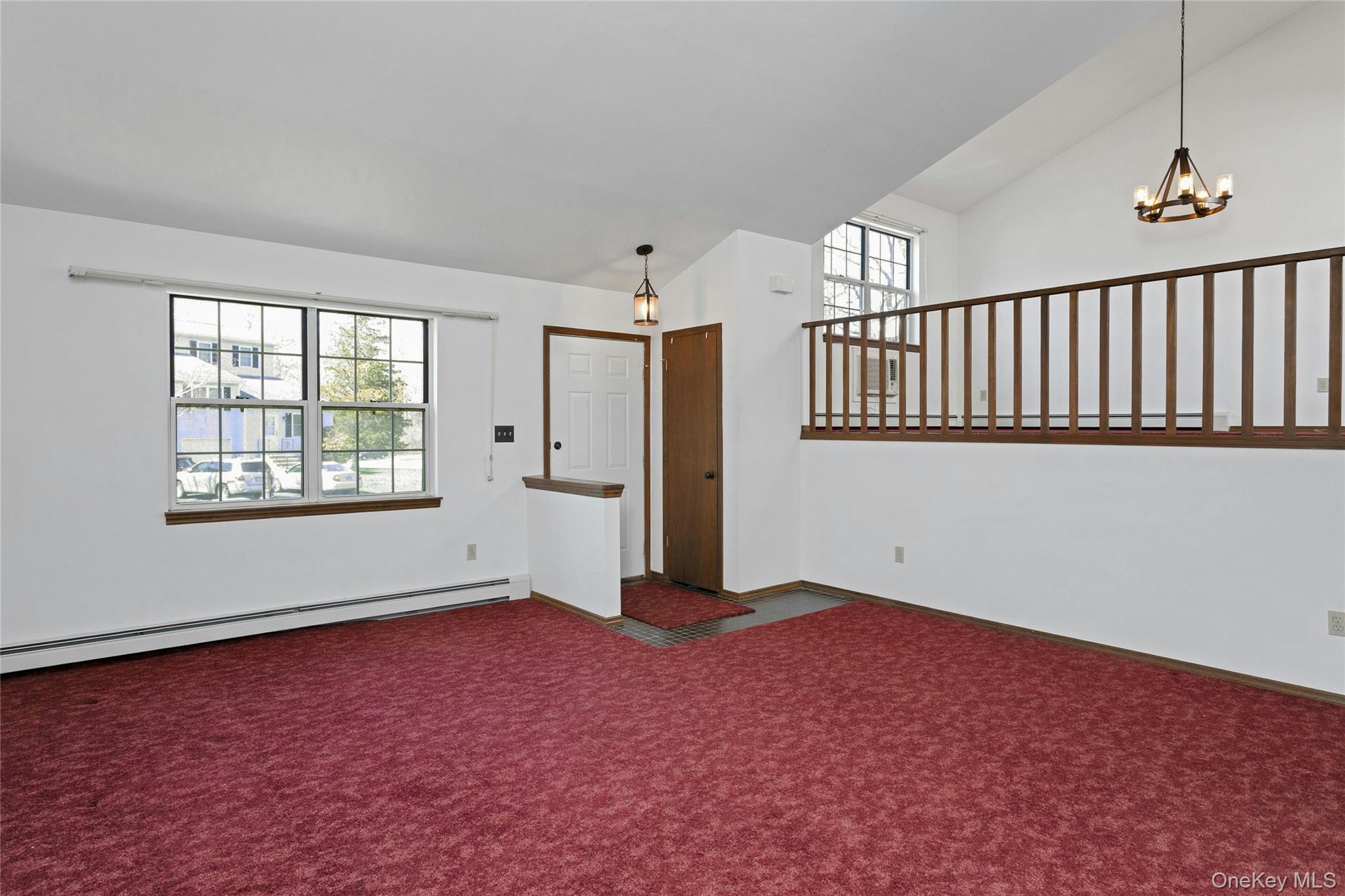 6 Elm Court Fishkill, NY 12524 - Photo 2 of 18 a view of an empty room with a window