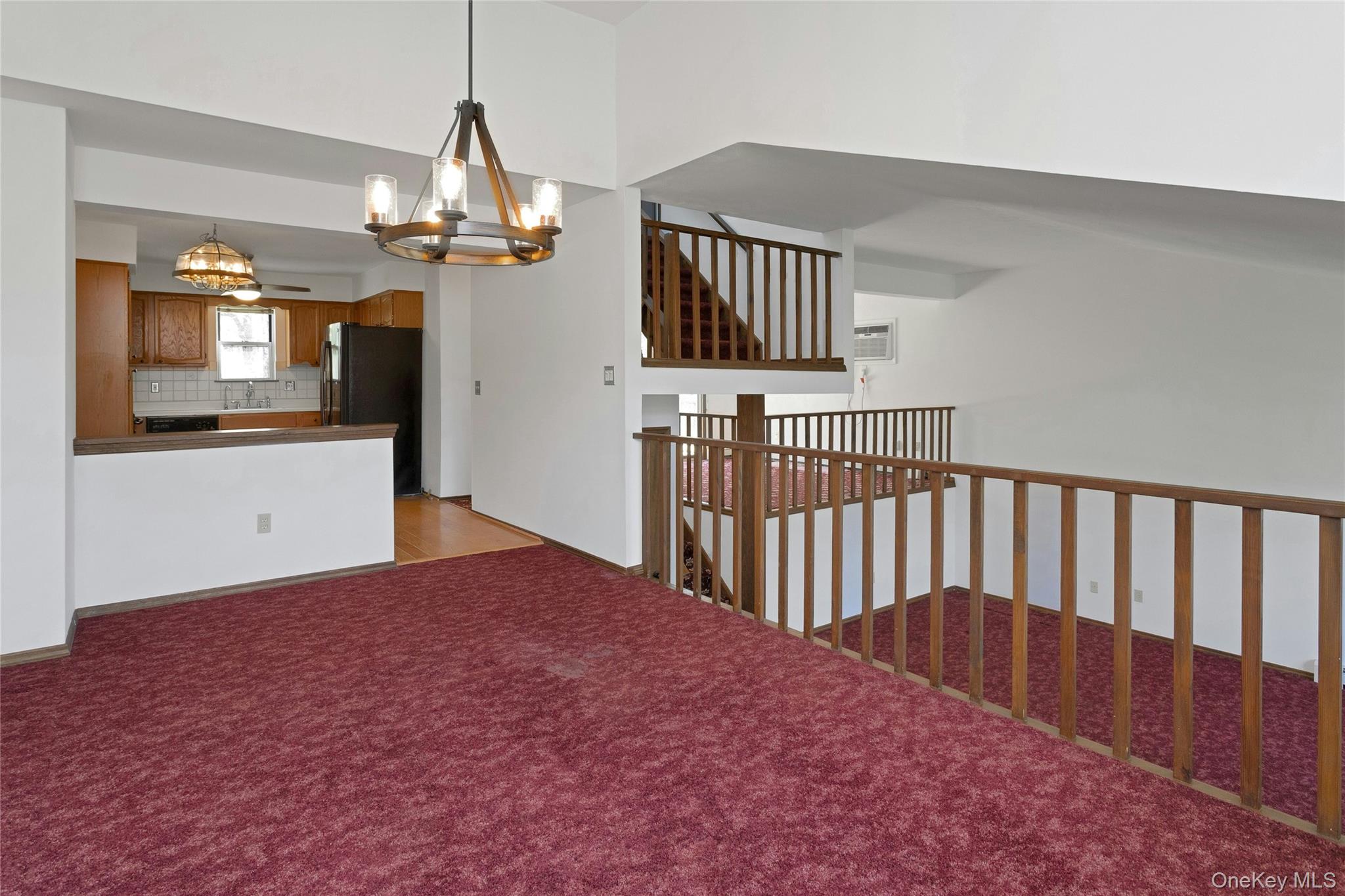 6 Elm Court Fishkill, NY 12524 - Photo 6 of 18 a view of livingroom with furniture and chandelier