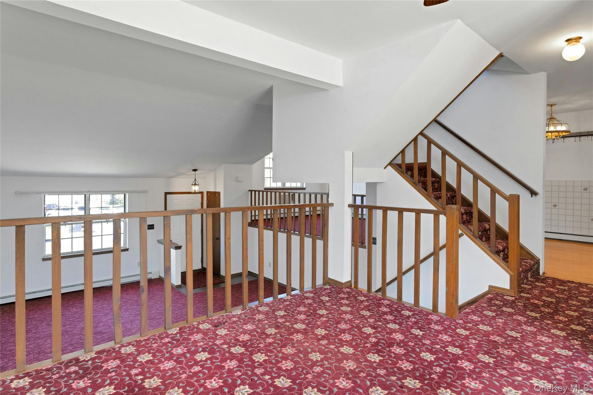 6 Elm Court Fishkill, NY 12524 - Photo 9 of 18 a view of entryway and hall with wooden floor