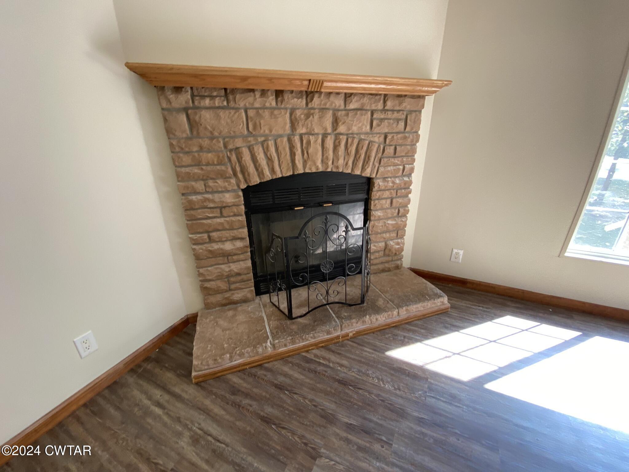 6555 Roby Road Enville, TN 38332 - Photo 15 of 22 a living room with a fireplace