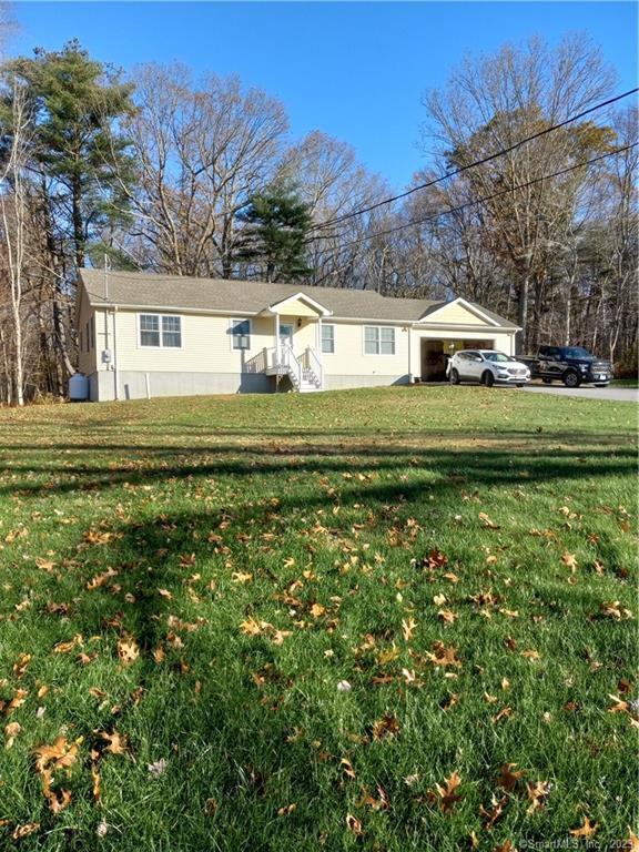 24 Indian Hollow Road Windham, CT 06280 - Photo 1 of 1 One floor living in this 2017 custom ranch on 1.38 wooded and open acres