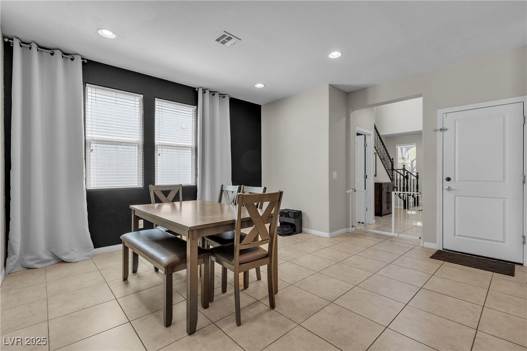9950 Coyote Echo Court Las Vegas, NV 89166 - Photo 5 of 71 Dining room featuring light tile patterned floors and recessed lighting