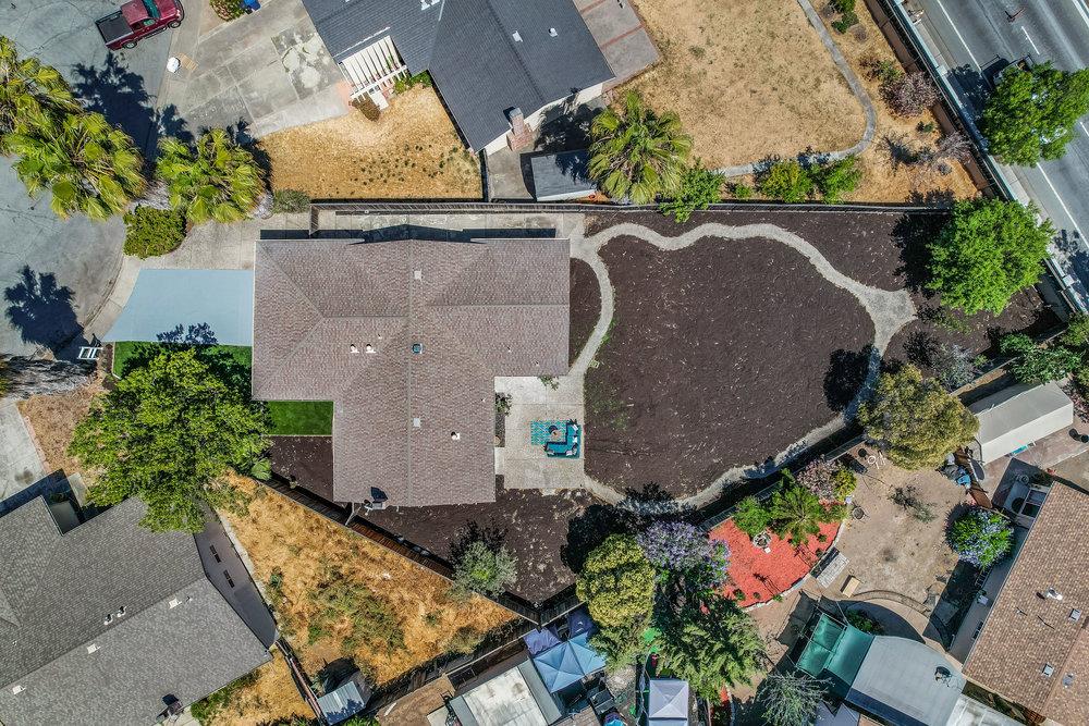 5642 Geranium Court Newark, CA 94560 - Photo 25 of 30 an aerial view of a house with a yard and a large tree