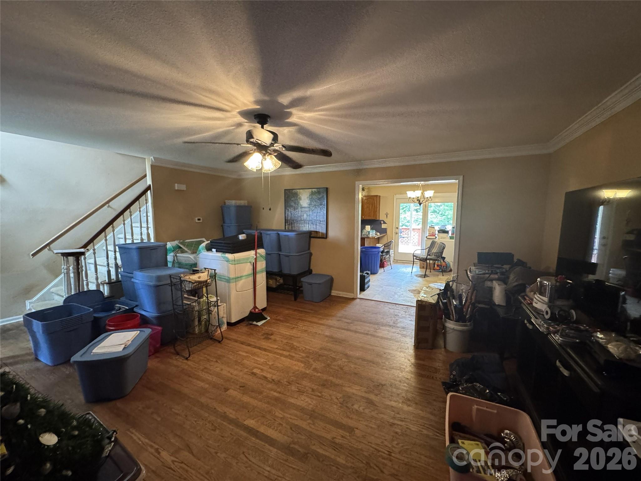 8441 Shelley Mullis Road Fort Mill, SC 29707 - Photo 5 of 23 a living room with furniture and a flat screen tv