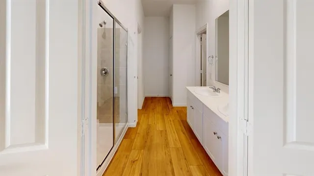a view of a bathroom with sink and bathtub