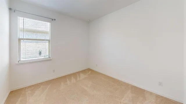 a view of a small space with a window