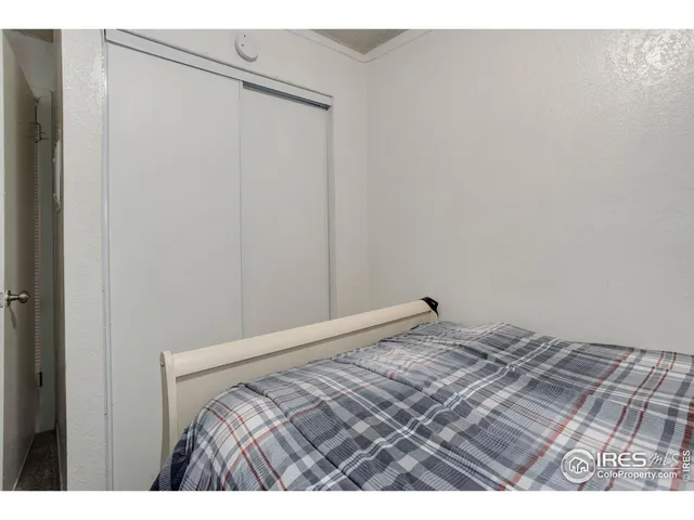 a bedroom with a bed