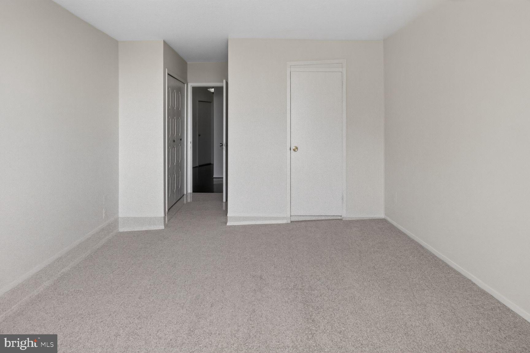 5225 Pooks Hill Road, Unit 1301N Bethesda, MD 20814 - Photo 13 of 26 a view of an empty room and closet area