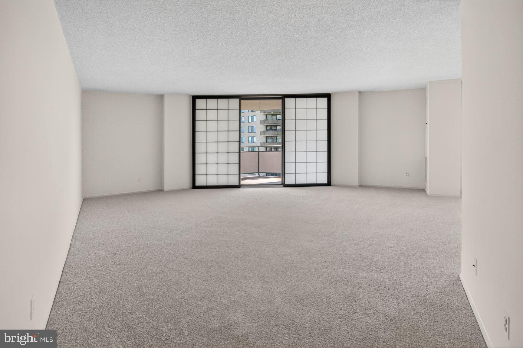 5225 Pooks Hill Road, Unit 1301N Bethesda, MD 20814 - Photo 3 of 26 a view of an empty room with a window