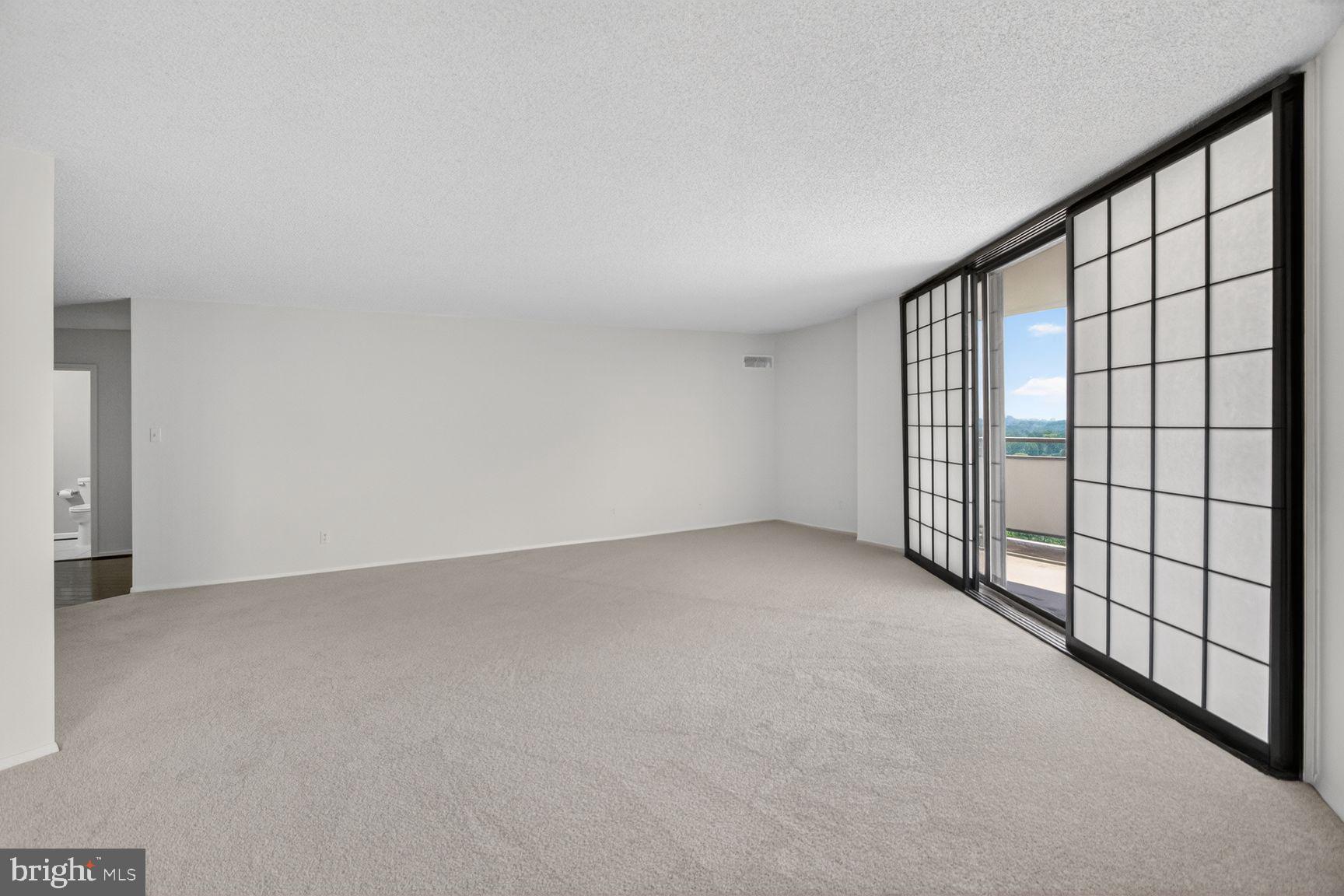 5225 Pooks Hill Road, Unit 1301N Bethesda, MD 20814 - Photo 4 of 26 a view of an empty room with a window