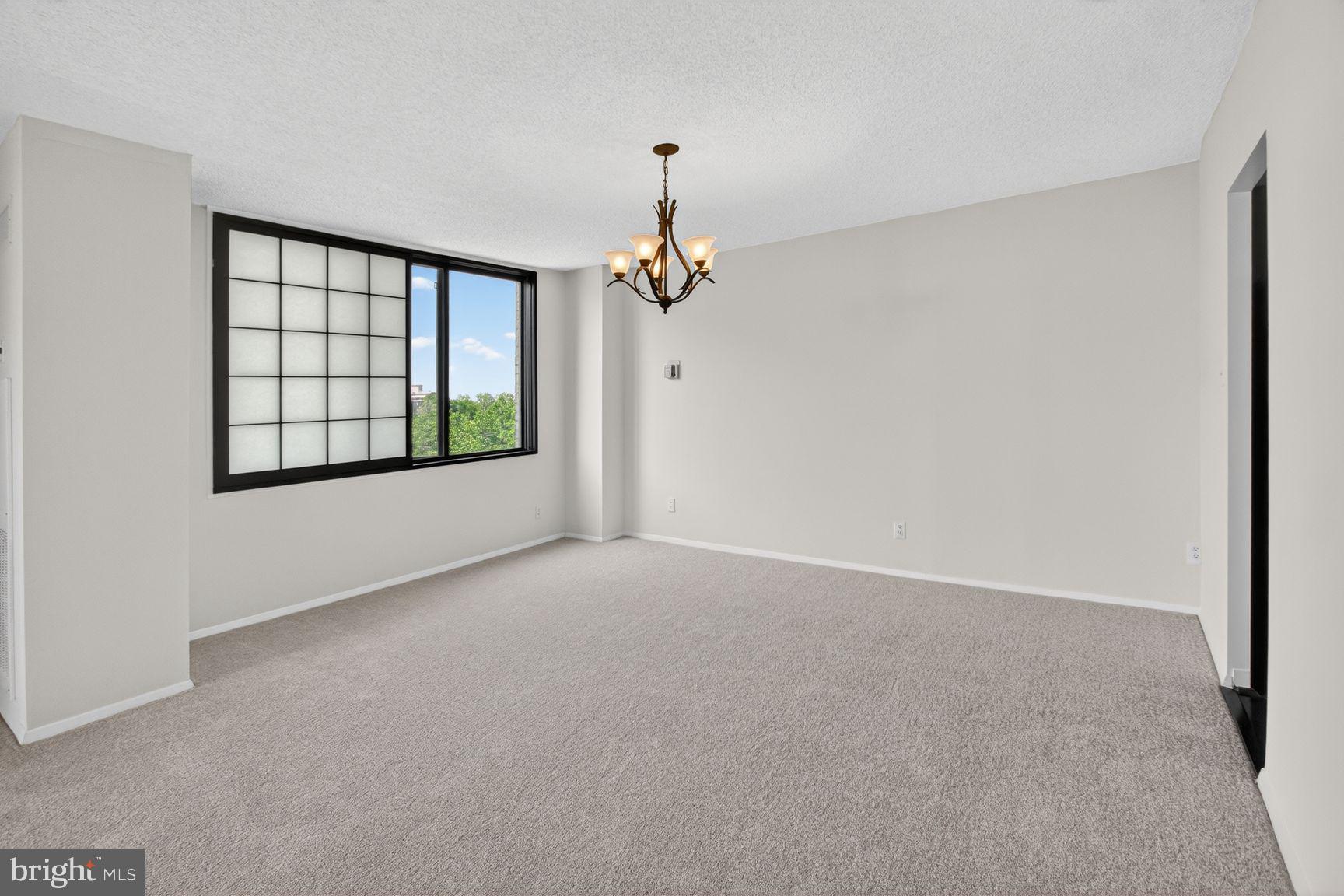 5225 Pooks Hill Road, Unit 1301N Bethesda, MD 20814 - Photo 6 of 26 a view of a room with a window