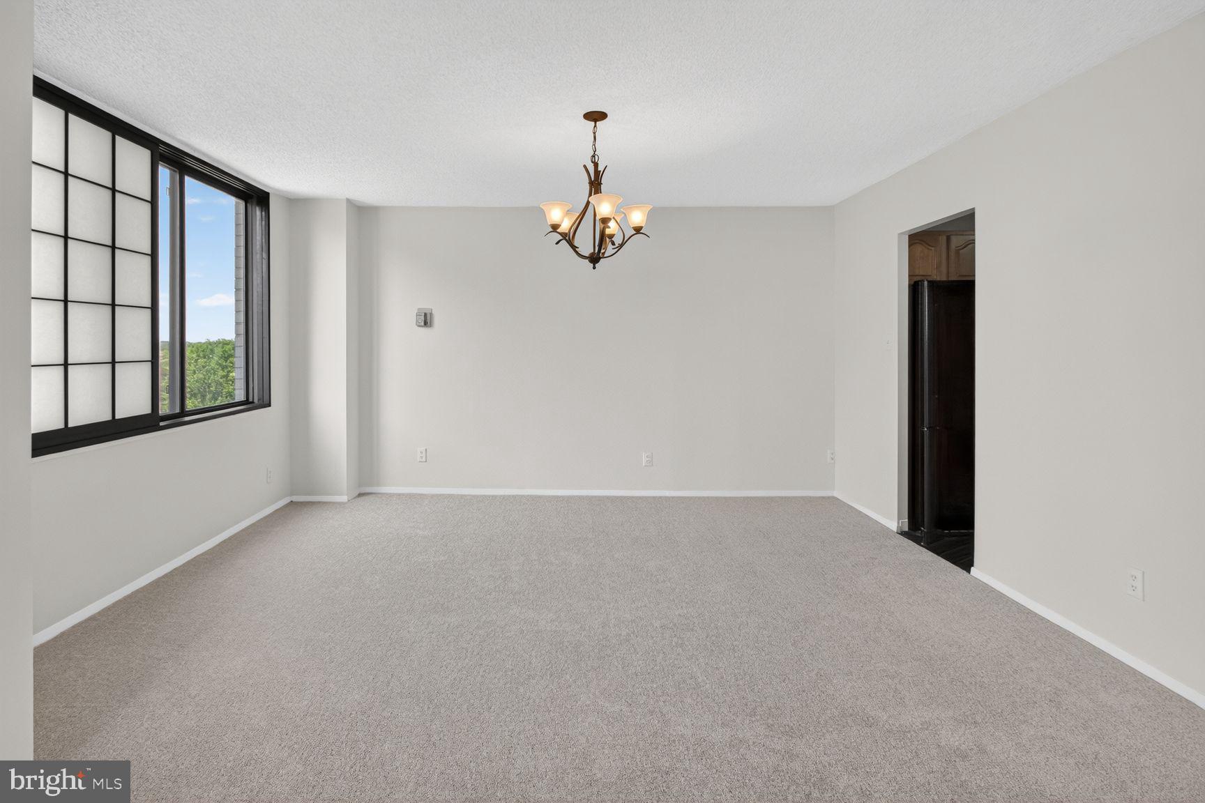 5225 Pooks Hill Road, Unit 1301N Bethesda, MD 20814 - Photo 7 of 26 a view of an empty room with a window