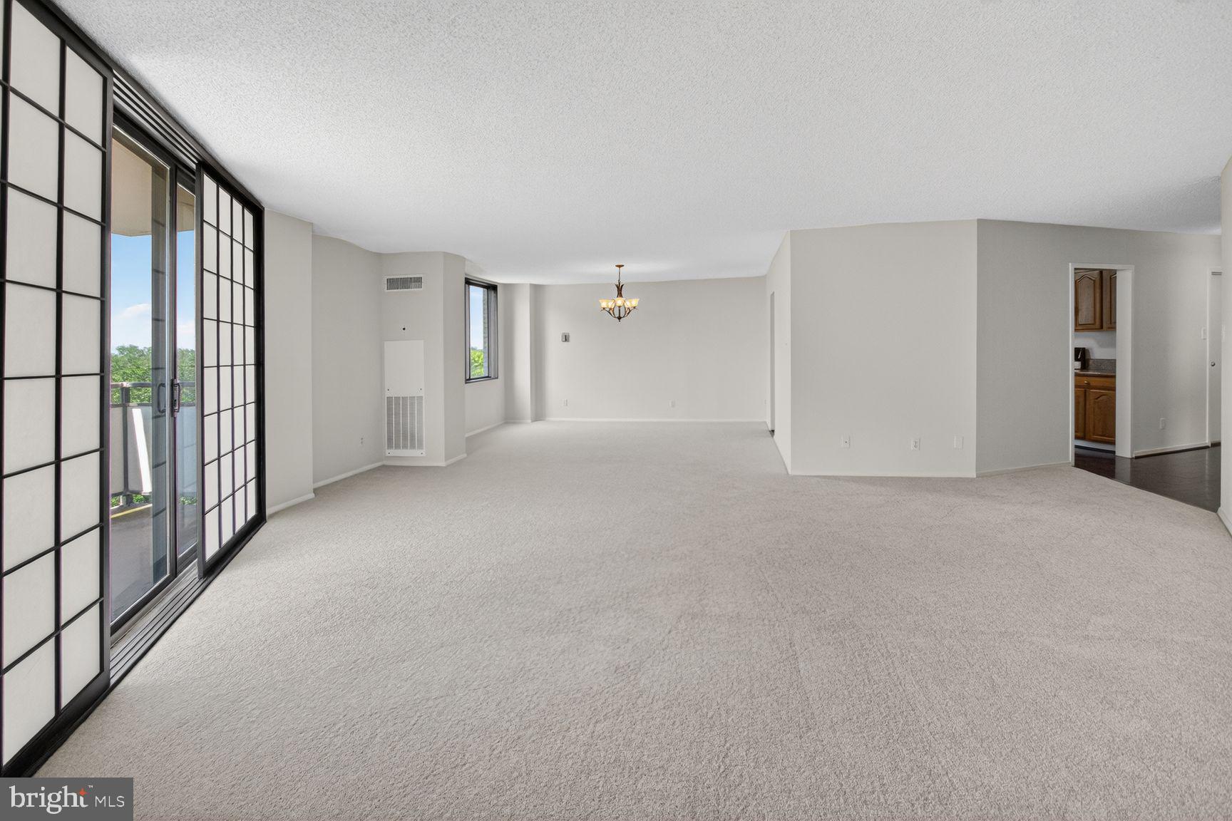 5225 Pooks Hill Road, Unit 1301N Bethesda, MD 20814 - Photo 7 of 30 Living Room open to Dining Area