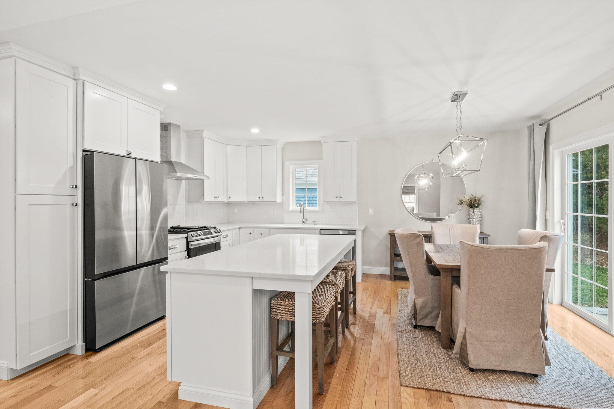 11 Azalea Lane Mashpee, MA 02649 - Photo 11 of 41 a kitchen with counter top space cabinets and stainless steel appliances