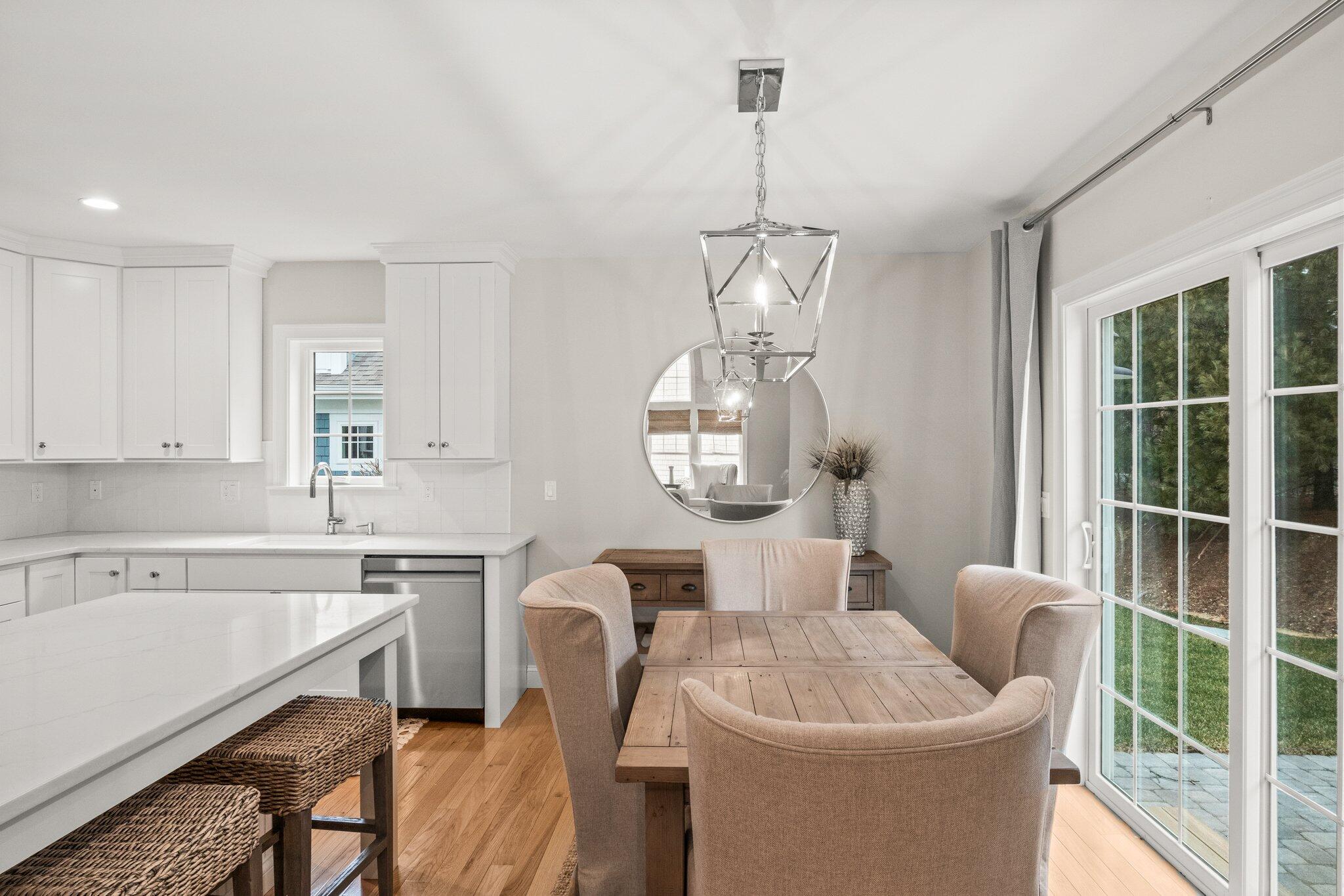 11 Azalea Lane Mashpee, MA 02649 - Photo 15 of 41 a very nice looking dining room with a table and chairs