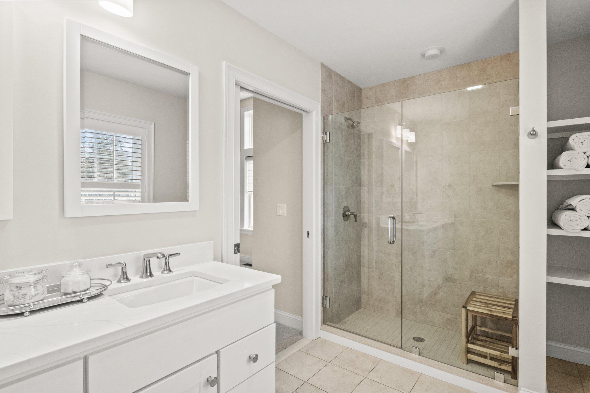 11 Azalea Lane Mashpee, MA 02649 - Photo 19 of 41 a bathroom with a granite countertop sink mirror and shower