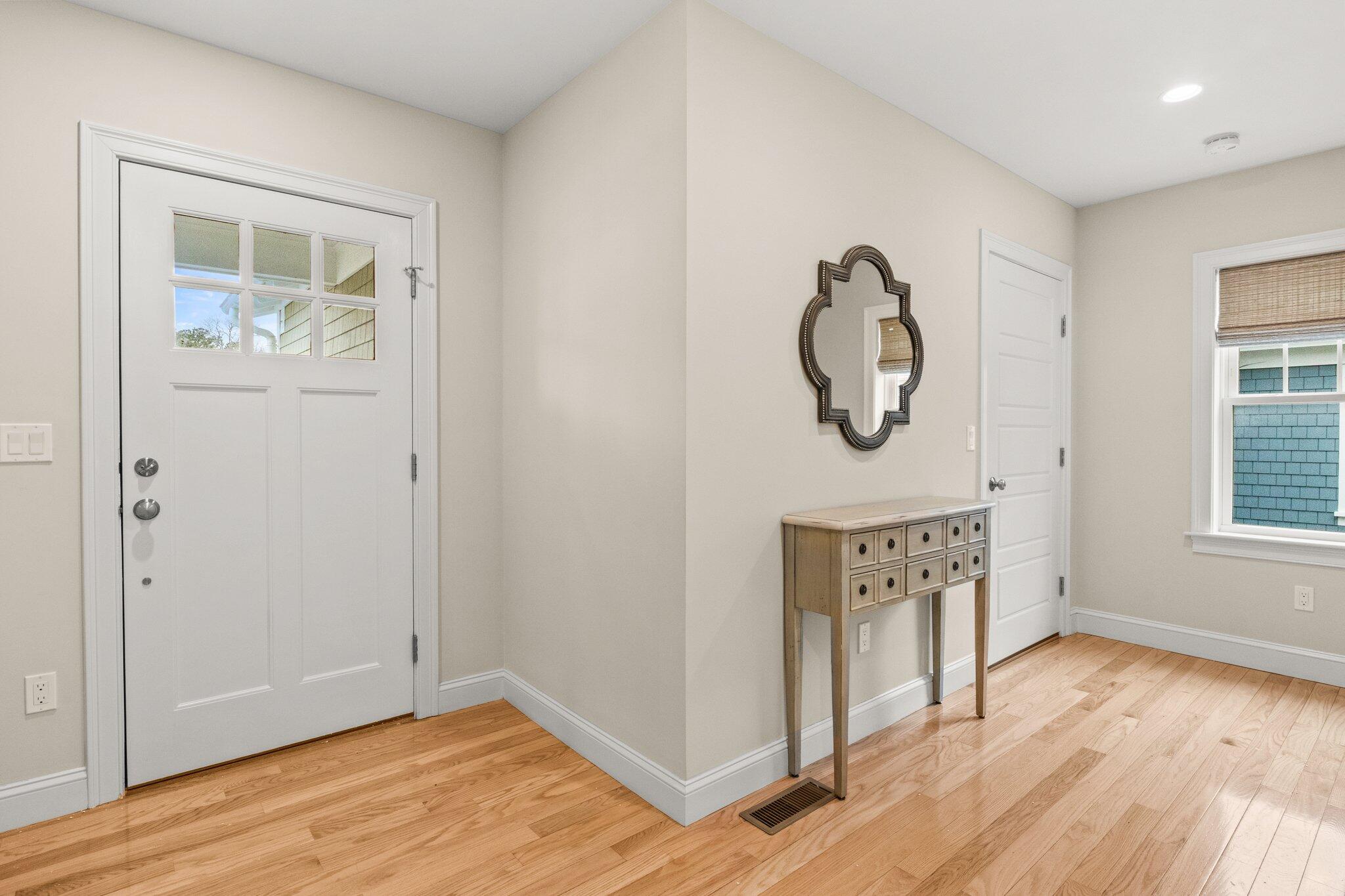11 Azalea Lane Mashpee, MA 02649 - Photo 3 of 41 a view of a room with wooden floor cabinet and windows