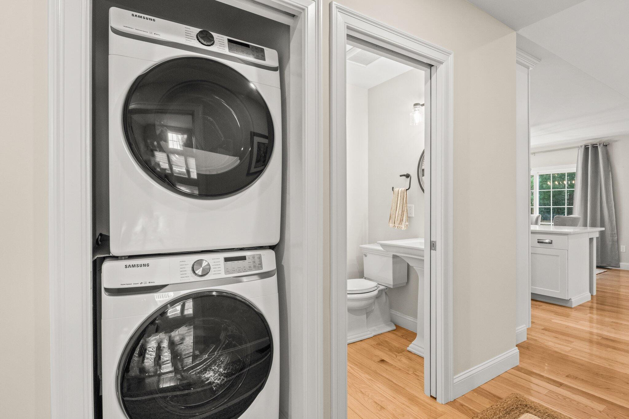 11 Azalea Lane Mashpee, MA 02649 - Photo 5 of 41 a view of a hallway with washer and dryer