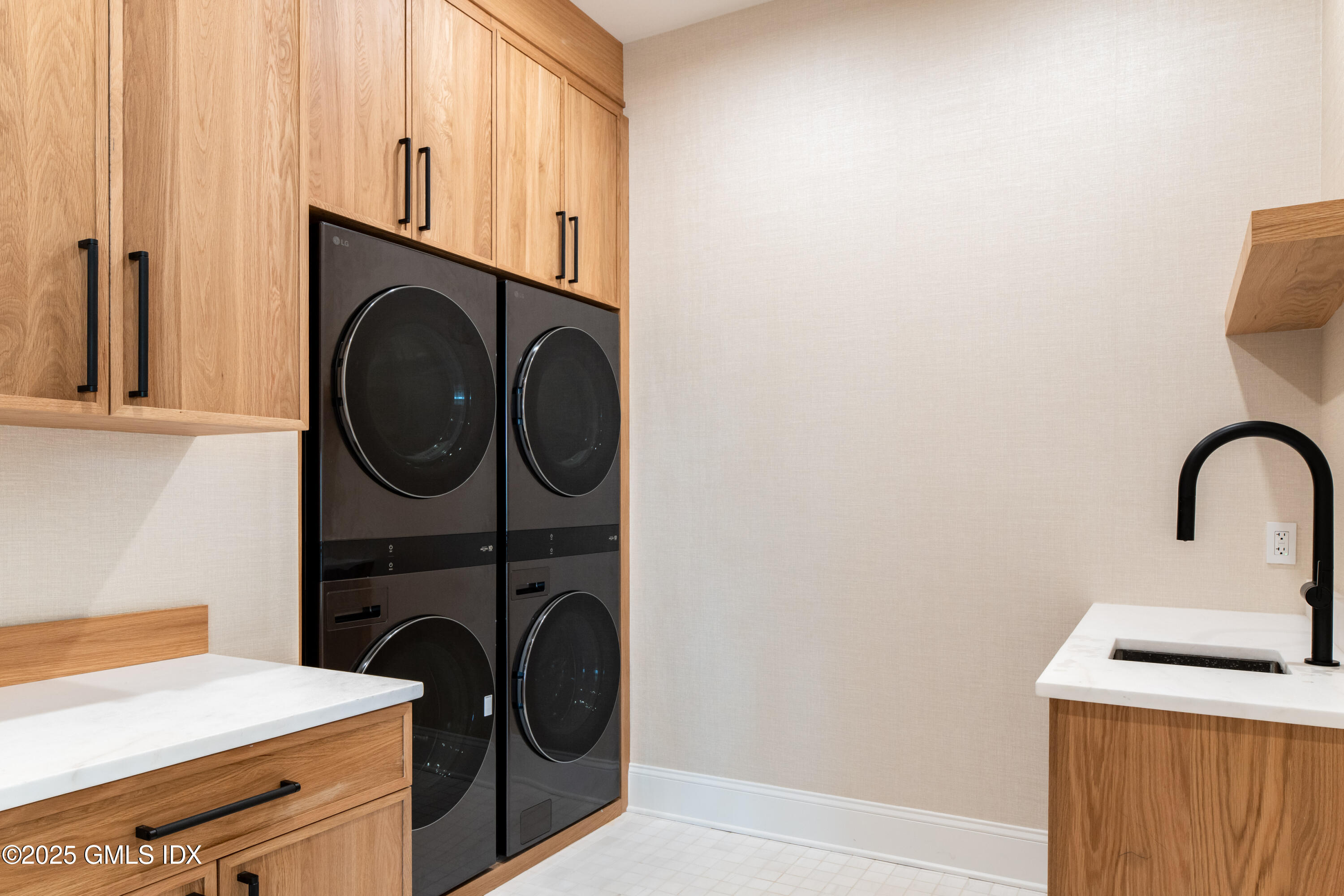 11 Winterset Road Greenwich, CT 06830 - Photo 13 of 14 a utility room with dryer and washer