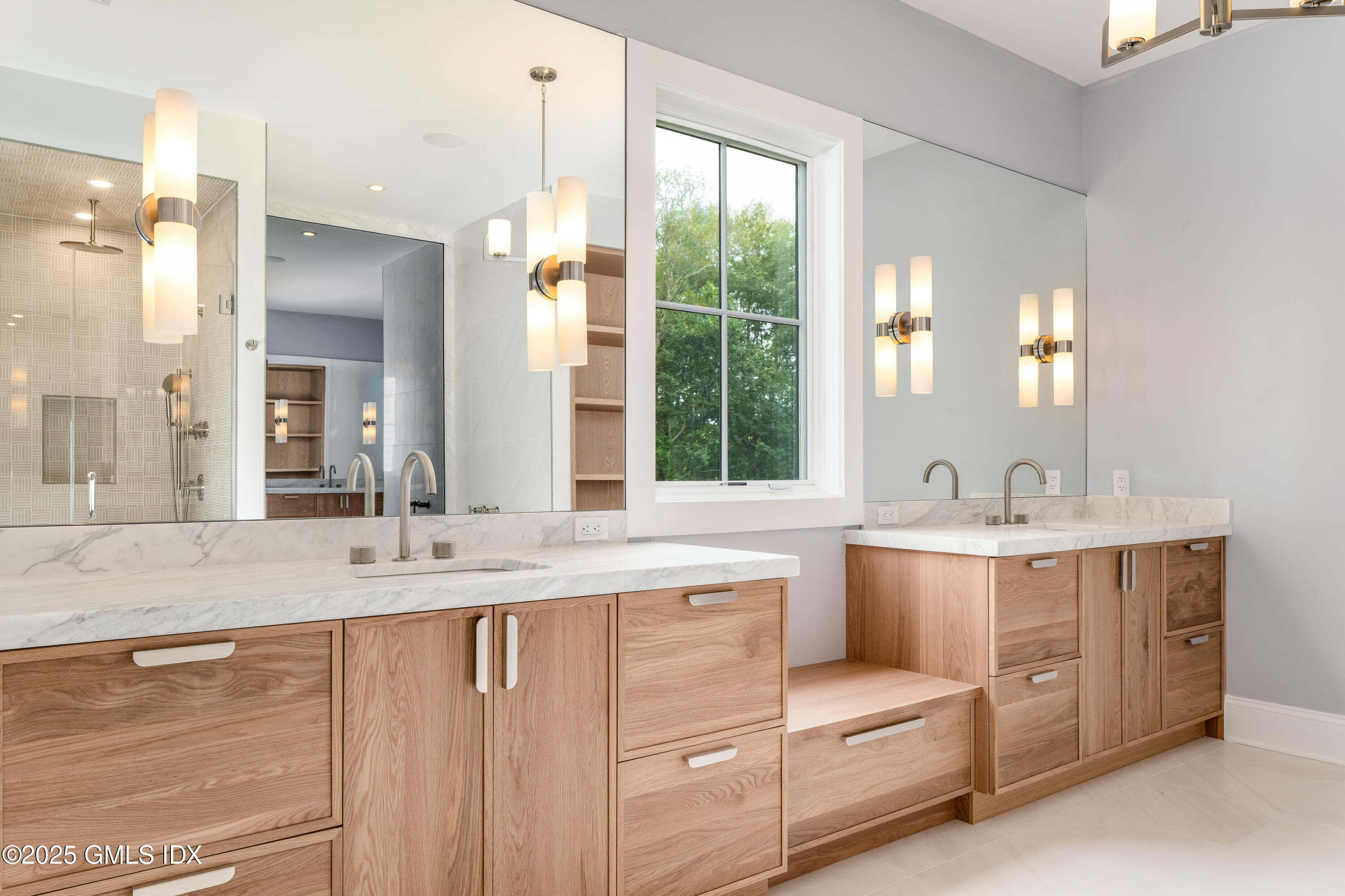 11 Winterset Road Greenwich, CT 06830 - Photo 7 of 14 a bathroom with a sink double vanity mirror and a bathtub