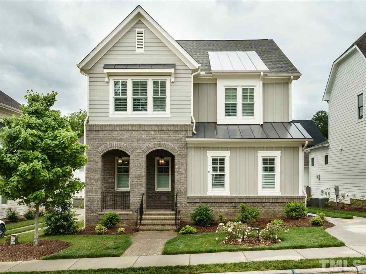 710 Virginia Avenue Raleigh, NC 27604 - Photo 1 of 25 a front view of a house with garden
