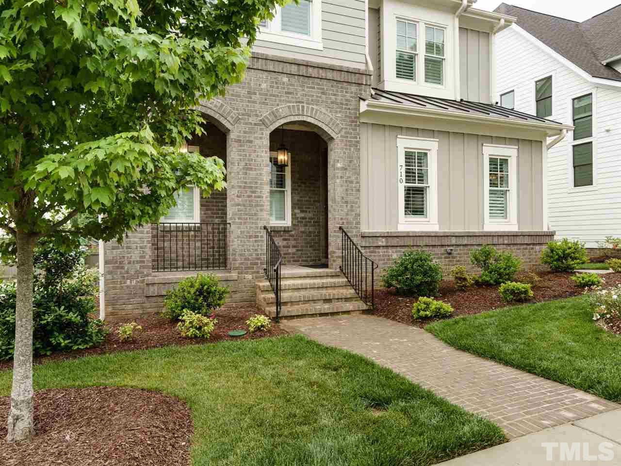 710 Virginia Avenue Raleigh, NC 27604 - Photo 2 of 25 a front view of a house with garden