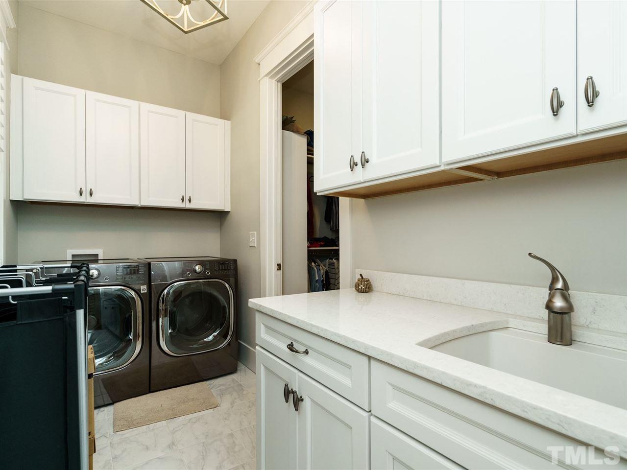 710 Virginia Avenue Raleigh, NC 27604 - Photo 14 of 25 a kitchen with a sink and cabinets