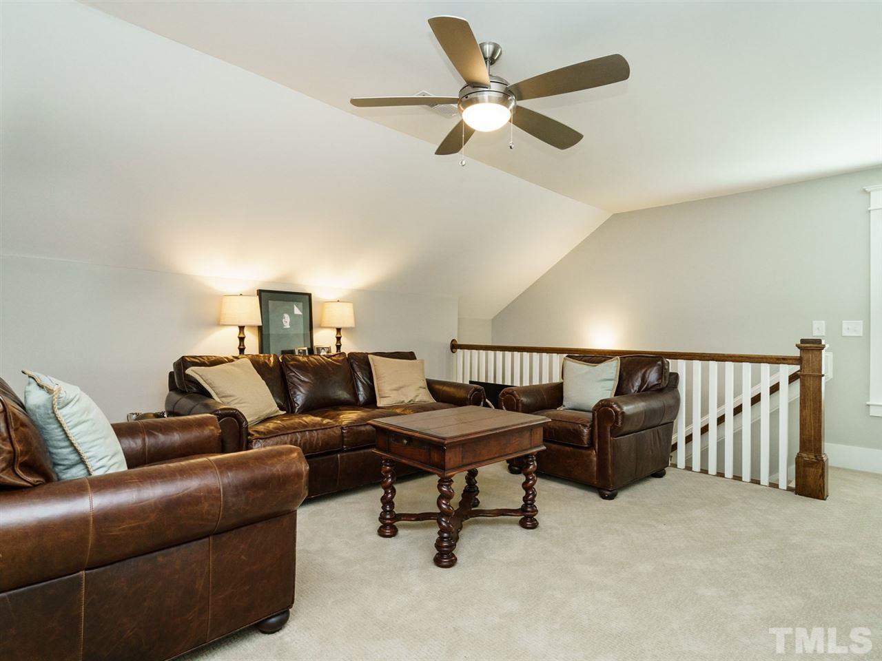 710 Virginia Avenue Raleigh, NC 27604 - Photo 21 of 25 a living room with furniture