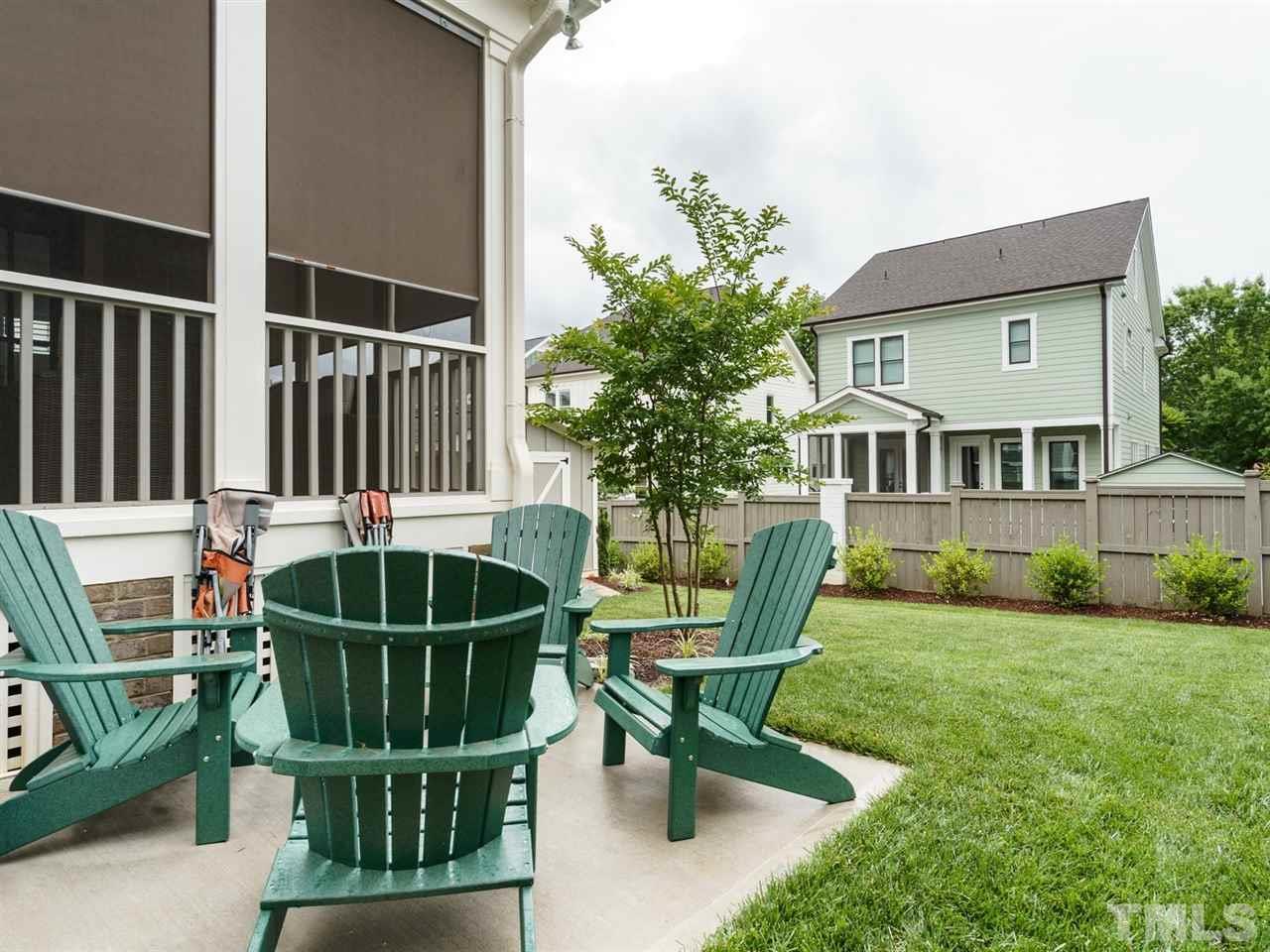 710 Virginia Avenue Raleigh, NC 27604 - Photo 24 of 25 a view of a chair and table in backyard of the house