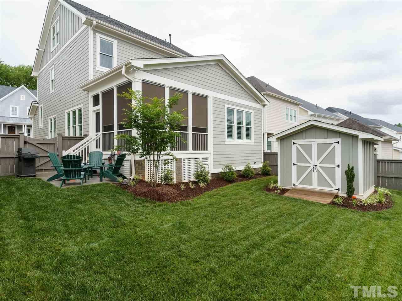 710 Virginia Avenue Raleigh, NC 27604 - Photo 25 of 25 a front view of a house with a yard and porch