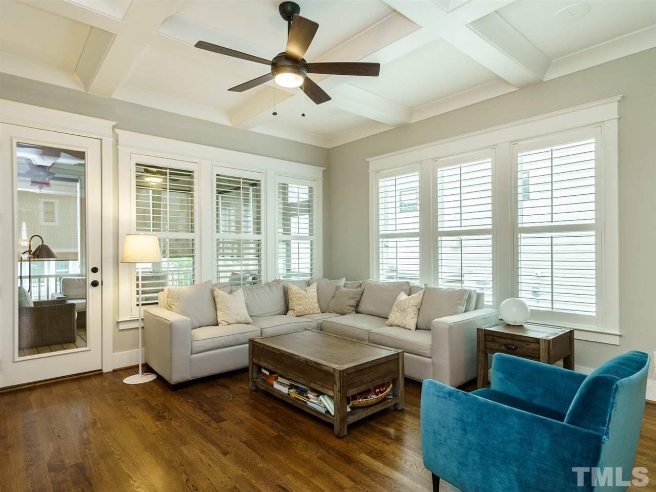 710 Virginia Avenue Raleigh, NC 27604 - Photo 8 of 25 a living room with furniture and a large window