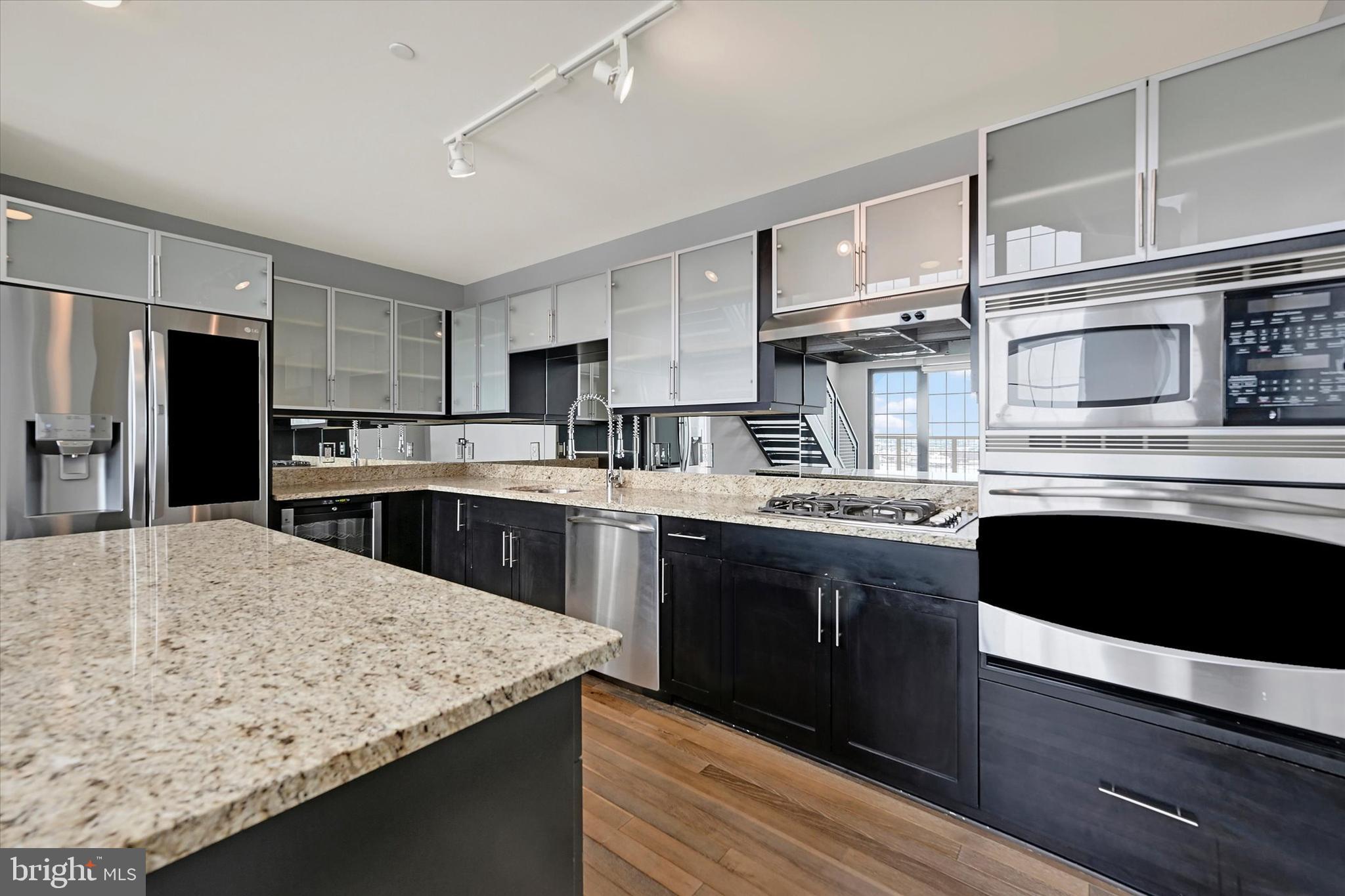 1200 Steuart Street, Unit 1913 Baltimore, MD 21230 - Photo 26 of 94 Sleek gourmet Kitchen.